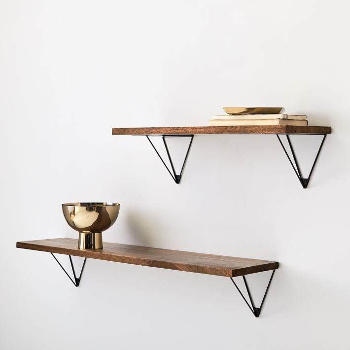 Triangle brackets on wall shelf - gold and wood