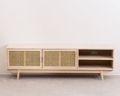 A beige Abbey Cane Cabinet with cane panel inserts, featuring multiple compartments and an open shelf, set against a neutral background. Front View.